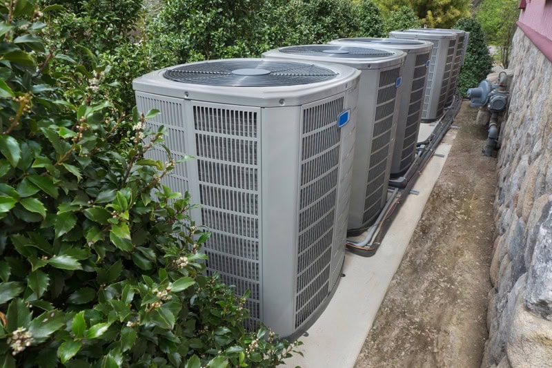 AC_B_003-iStock-690149884 Air Conditioning Basics––Did You Know? Working air conditioning units.
